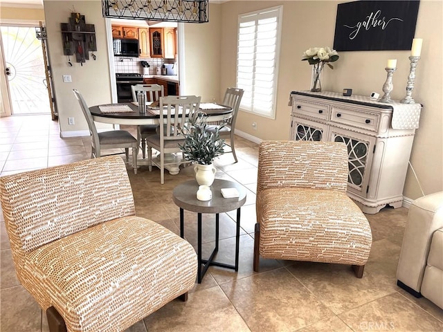 3747 Vista Campana S Unit 7, Oceanside, CA 92057 - living area featuring light tile patterned floors and baseboards