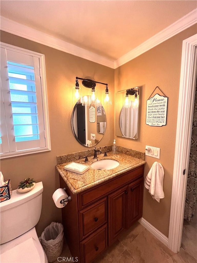 3747 Vista Campana S Unit 7, Oceanside, CA 92057 - bathroom featuring vanity, ornamental molding, toilet, and baseboards