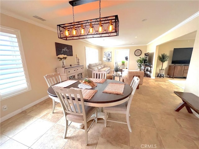 3747 Vista Campana S Unit 7, Oceanside, CA 92057 - dining area featuring crown molding, light tile patterned floors, and baseboards