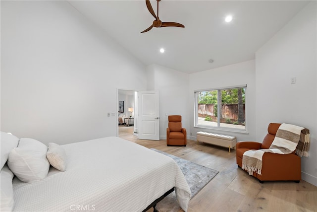24572 Wembley Cir, Laguna Hills, CA 92653 - bedroom featuring high vaulted ceiling, light wood finished floors, ceiling fan, recessed lighting, and baseboards