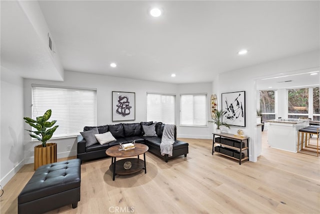 24572 Wembley Cir, Laguna Hills, CA 92653 - living room featuring light wood-style flooring, baseboards, and recessed lighting