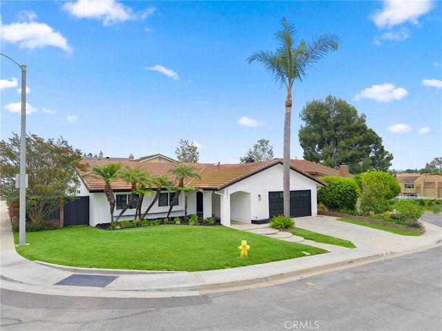 4592 Paloma Ln, Yorba Linda, CA 92886 - ranch-style home featuring a garage, stucco siding, a tile roof, and driveway