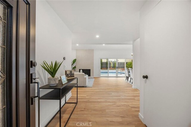 4592 Paloma Ln, Yorba Linda, CA 92886 - hallway with recessed lighting, light wood finished floors, and baseboards