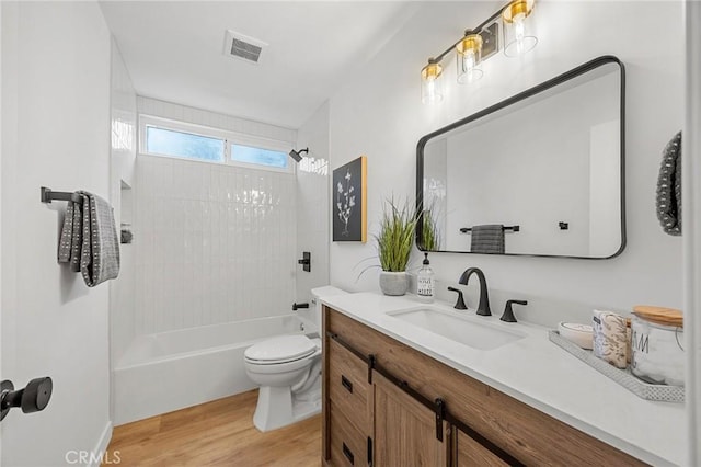 4592 Paloma Ln, Yorba Linda, CA 92886 - bathroom with vanity, wood finished floors, toilet, and shower / bathtub combination