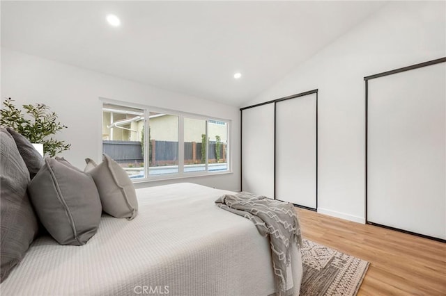 4592 Paloma Ln, Yorba Linda, CA 92886 - bedroom featuring light wood-type flooring, lofted ceiling, and recessed lighting
