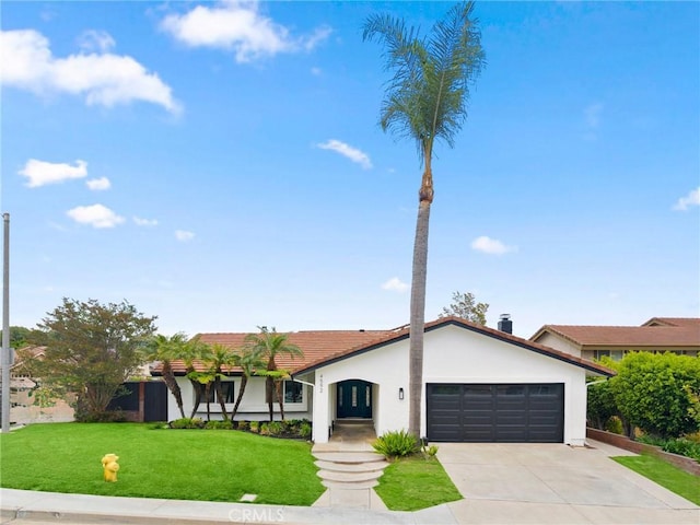 4592 Paloma Ln, Yorba Linda, CA 92886 - view of front facade with a garage, concrete driveway, a front lawn, stucco siding, and a tile roof