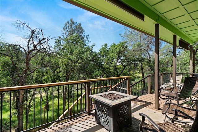 12760 Center Gap Rd, Chico, CA 95928 - wooden terrace with a fire pit and view of scattered trees