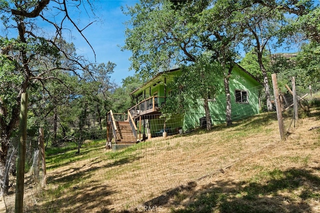 12760 Center Gap Rd, Chico, CA 95928 - view of home's exterior with stairs, a deck, and a yard