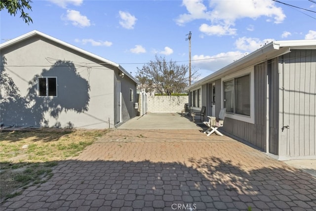 19903 Vanowen St, Winnetka, CA 91306 - view of property exterior featuring a patio and fence