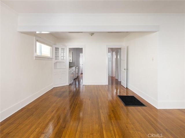 1122 Loma Dr, Hermosa Beach, CA 90254 - unfurnished living room with baseboards, dark wood finished floors, and crown molding