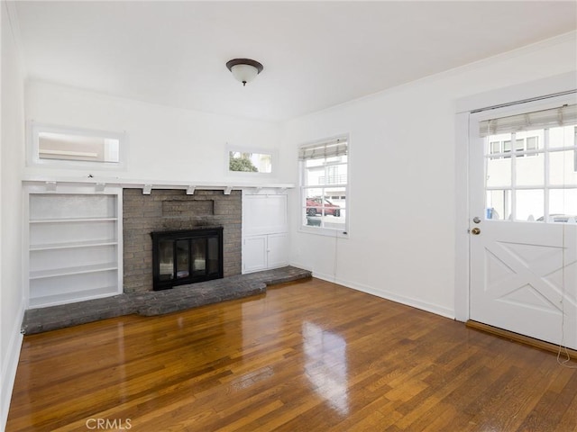 1122 Loma Dr, Hermosa Beach, CA 90254 - unfurnished living room featuring dark wood-style flooring, healthy amount of natural light, a fireplace, and baseboards