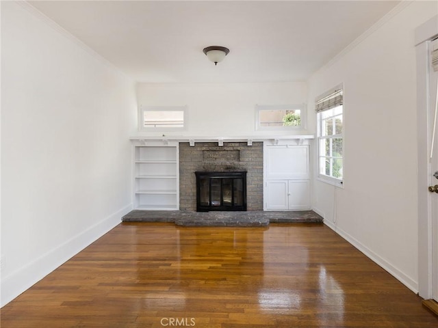1122 Loma Dr, Hermosa Beach, CA 90254 - unfurnished living room with wood finished floors, a fireplace, ornamental molding, and baseboards