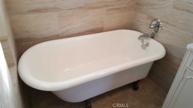 1122 Loma Dr, Hermosa Beach, CA 90254 - full bath featuring a freestanding tub and tile walls
