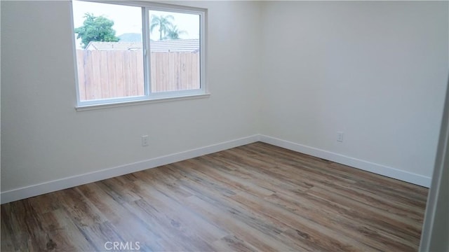 27798 Cloud Dance Ct, Menifee, CA 92585 - spare room with baseboards and wood finished floors