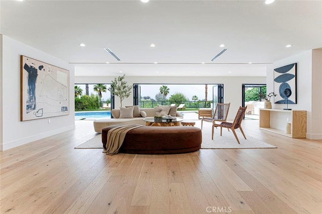18101 Green Meadow Dr, Encino, CA 91316 - living area featuring light wood-style flooring, baseboards, and recessed lighting