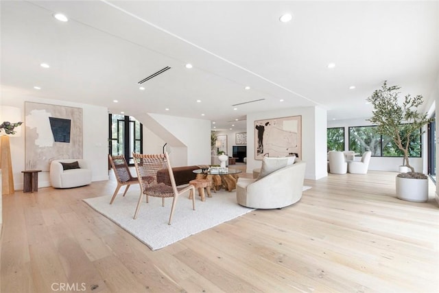 18101 Green Meadow Dr, Encino, CA 91316 - living room with light wood-style flooring and recessed lighting