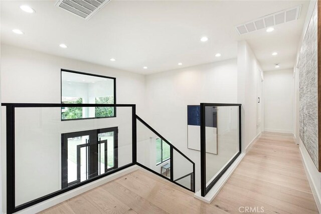 18101 Green Meadow Dr, Encino, CA 91316 - corridor featuring wood finished floors and recessed lighting