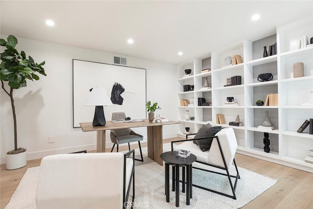 18101 Green Meadow Dr, Encino, CA 91316 - home office featuring light wood-type flooring, baseboards, and recessed lighting