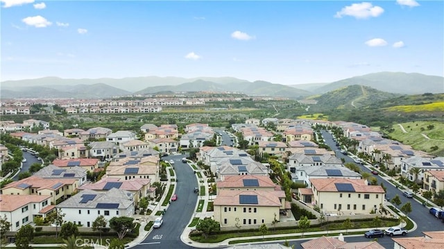 aerial view of residential area with mountains