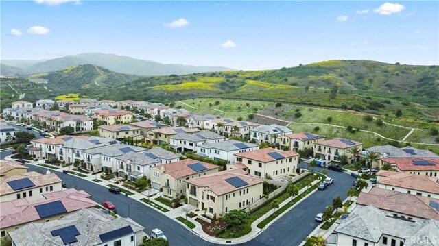 aerial view of residential area with a mountain backdrop