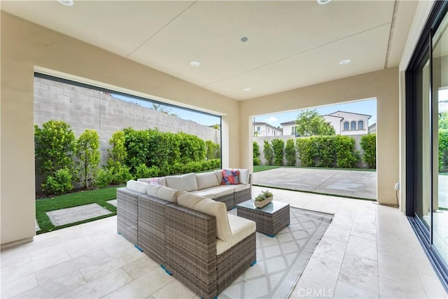 view of patio / terrace with an outdoor hangout area and a fenced backyard