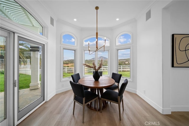 34105 Stage Rd, Temecula, CA 92592 - dining space with a chandelier, ornamental molding, light wood-style floors, baseboards, and recessed lighting