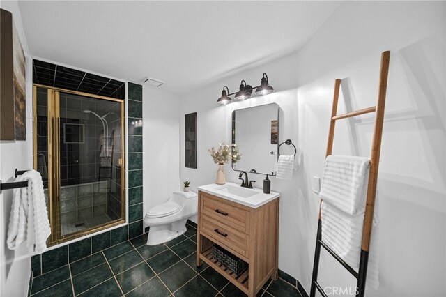 34105 Stage Rd, Temecula, CA 92592 - bathroom with a stall shower, vanity, toilet, and tile patterned flooring