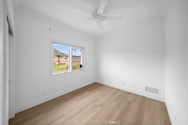 34105 Stage Rd, Temecula, CA 92592 - unfurnished room featuring light wood-style flooring, crown molding, baseboards, and ceiling fan
