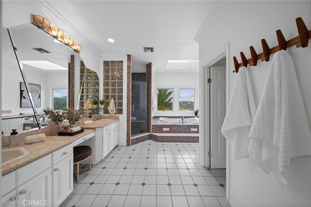 34105 Stage Rd, Temecula, CA 92592 - bathroom featuring tile patterned floors, a shower stall, ornamental molding, double vanity, and a garden tub