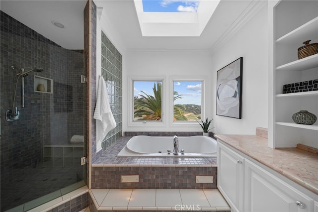 34105 Stage Rd, Temecula, CA 92592 - full bathroom featuring a skylight, a stall shower, a whirlpool tub, crown molding, and built in shelves