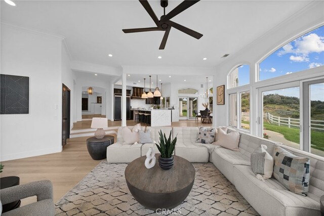 34105 Stage Rd, Temecula, CA 92592 - living area with ornamental molding, a ceiling fan, light wood-style floors, recessed lighting, and baseboards