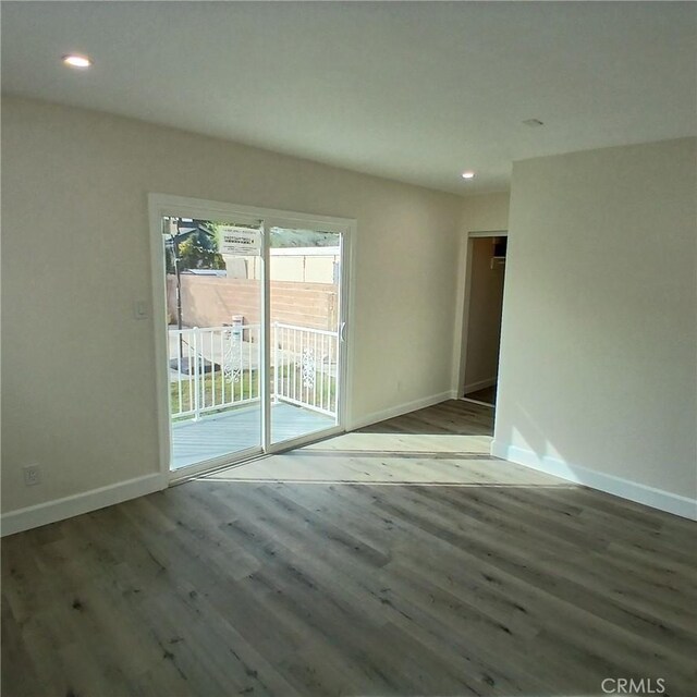 5109 S 7th Ave, Los Angeles, CA 90043 - empty room with recessed lighting, baseboards, and wood finished floors