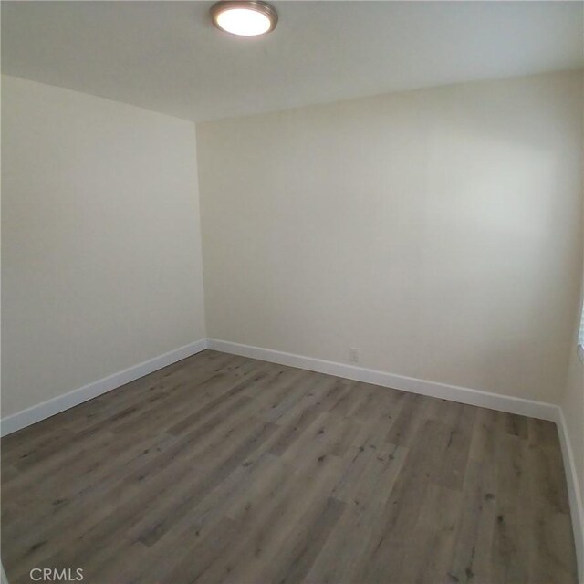 5109 S 7th Ave, Los Angeles, CA 90043 - unfurnished room with baseboards and wood finished floors