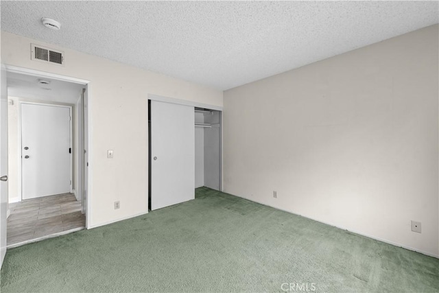 22244 Croll Ct, Diamond Bar, CA 91765 - unfurnished bedroom with carpet, a textured ceiling, and a closet