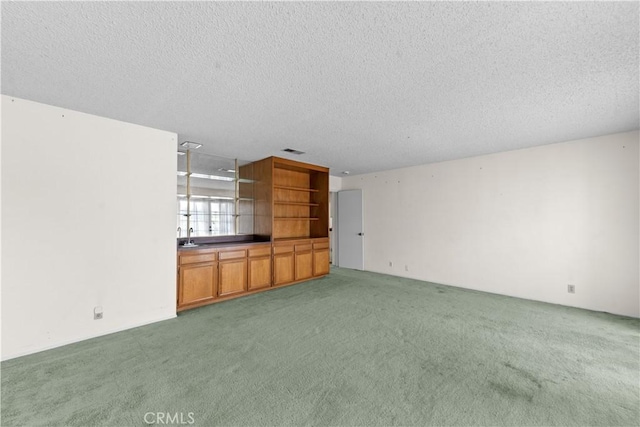 22244 Croll Ct, Diamond Bar, CA 91765 - unfurnished living room featuring light carpet, a textured ceiling, and a sink