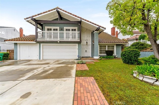 22244 Croll Ct, Diamond Bar, CA 91765 - view of front facade with a tile roof, a balcony, driveway, a front yard, and stucco siding