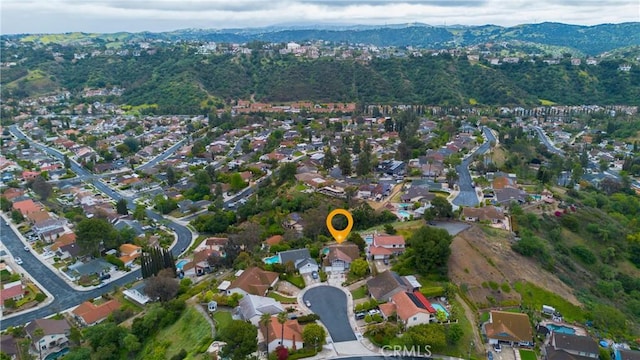 22244 Croll Ct, Diamond Bar, CA 91765 - aerial view of property's location with a mountainous background and nearby suburban area