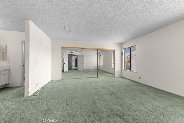 22244 Croll Ct, Diamond Bar, CA 91765 - unfurnished bedroom with carpet floors, a textured ceiling, and a closet
