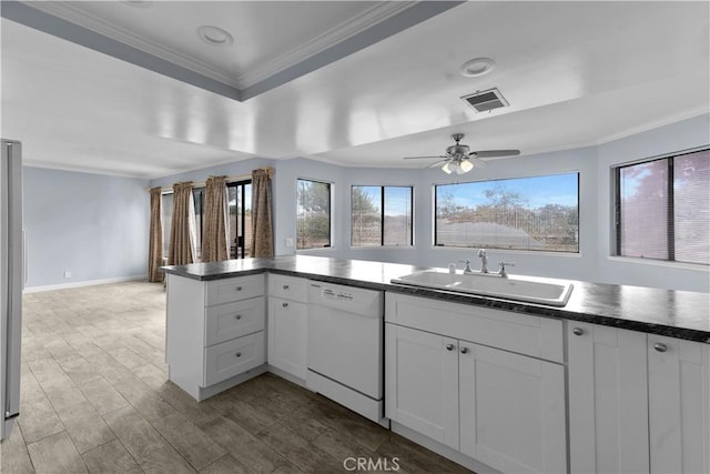 22244 Croll Ct, Diamond Bar, CA 91765 - kitchen featuring white dishwasher, a sink, dark countertops, crown molding, and plenty of natural light