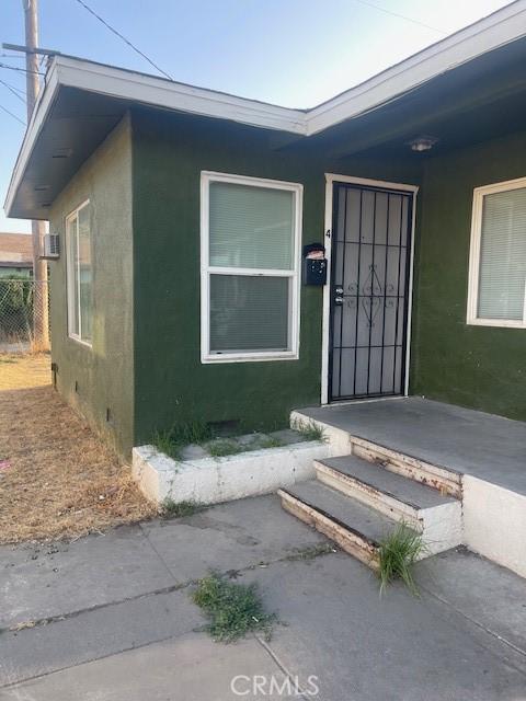 1951 Darrah St Unit 1, Ceres, CA 95307 - view of exterior entry featuring stucco siding