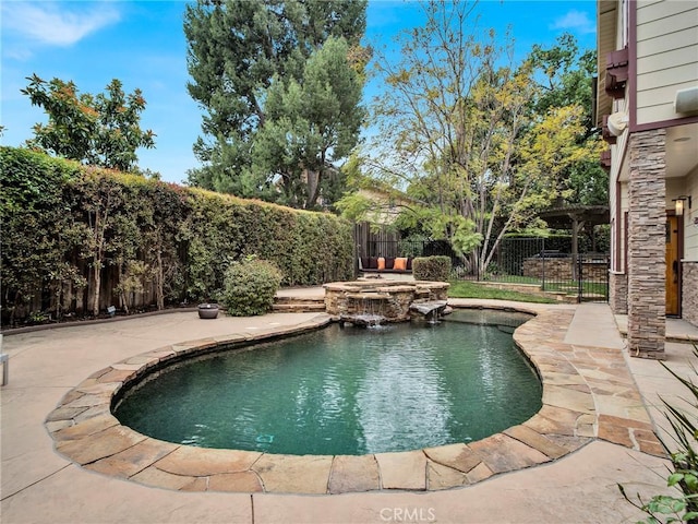 view of pool featuring a fenced backyard and a patio area