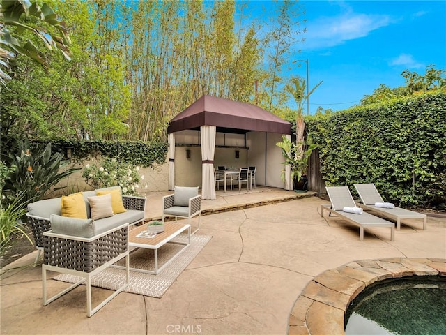 view of patio featuring an outdoor hangout area, a gazebo, a fenced backyard, outdoor dining space, and a pool