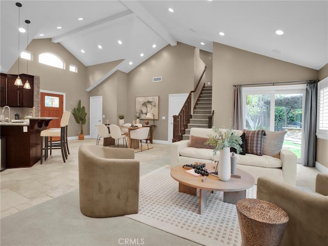 living room with high vaulted ceiling, recessed lighting, stairs, baseboards, and beamed ceiling