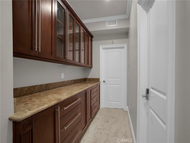 bar with light carpet and baseboards
