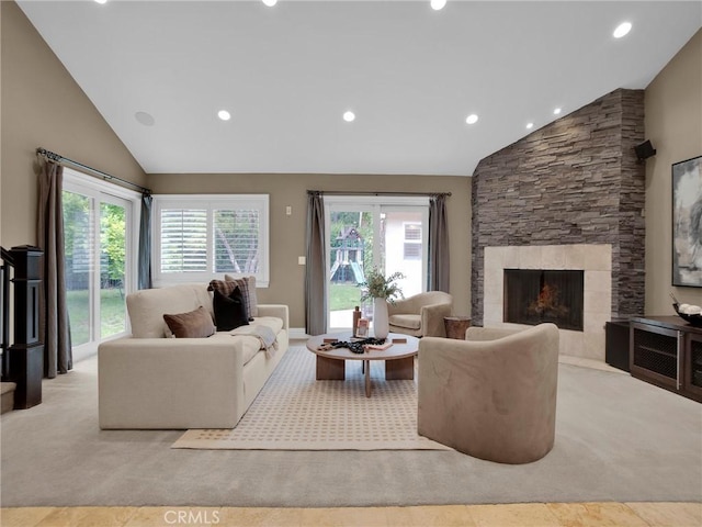 living area with lofted ceiling, a fireplace, recessed lighting, and carpet flooring