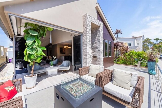 29 W Neapolitan Ln, Long Beach, CA 90803 - view of patio / terrace with an outdoor living space with a fire pit