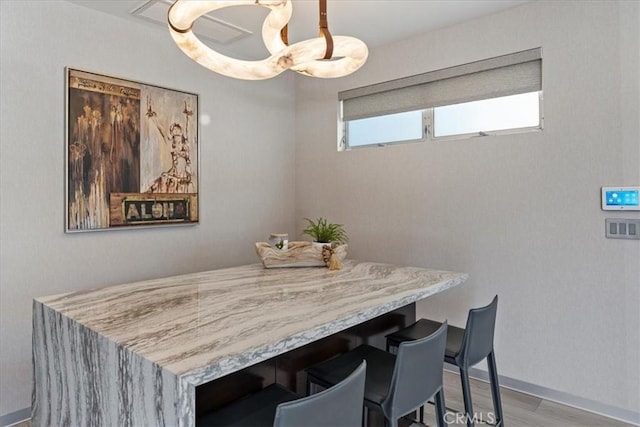 29 W Neapolitan Ln, Long Beach, CA 90803 - dining space featuring baseboards and wood finished floors