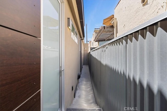 29 W Neapolitan Ln, Long Beach, CA 90803 - view of side of property with stucco siding and fence
