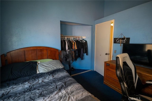 13117 Pan Am Blvd, Moreno Valley, CA 92553 - bedroom with a closet, dark carpet, and an office area