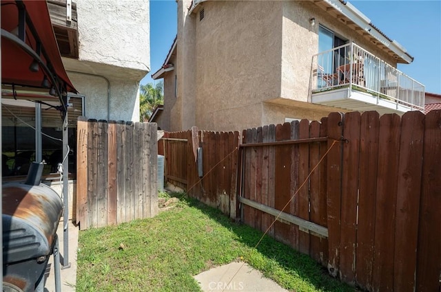 13117 Pan Am Blvd, Moreno Valley, CA 92553 - view of property exterior featuring stucco siding and a balcony